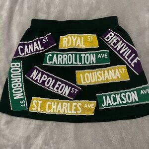 QUEEN OF SPARKLES Green Skirt with Nola Street Signs